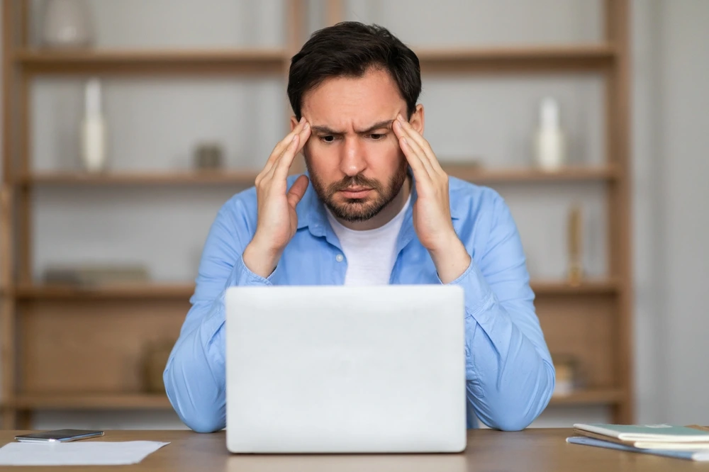 a-stressed-man-in-front-of-a-computer-box-truck-financing